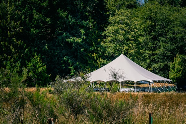 High peak tent in outdoor setting