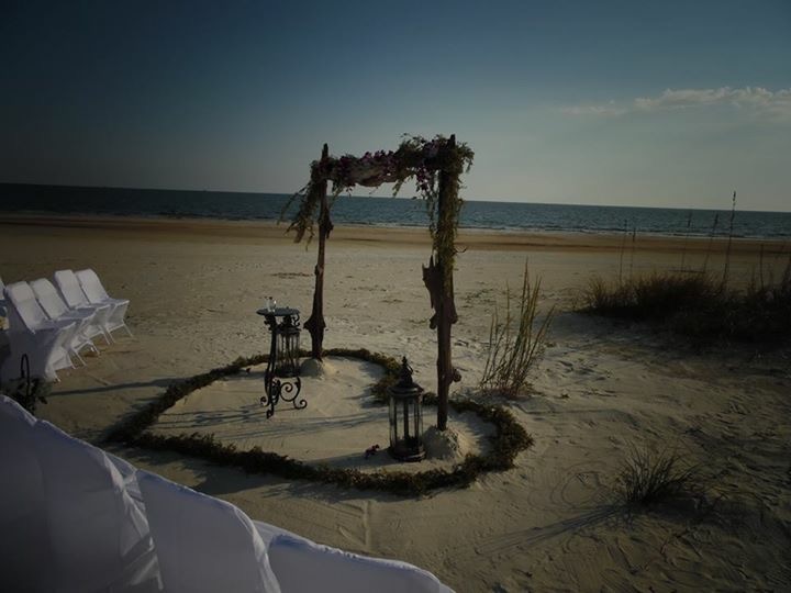Driftwood arch heart ring beach ceremony