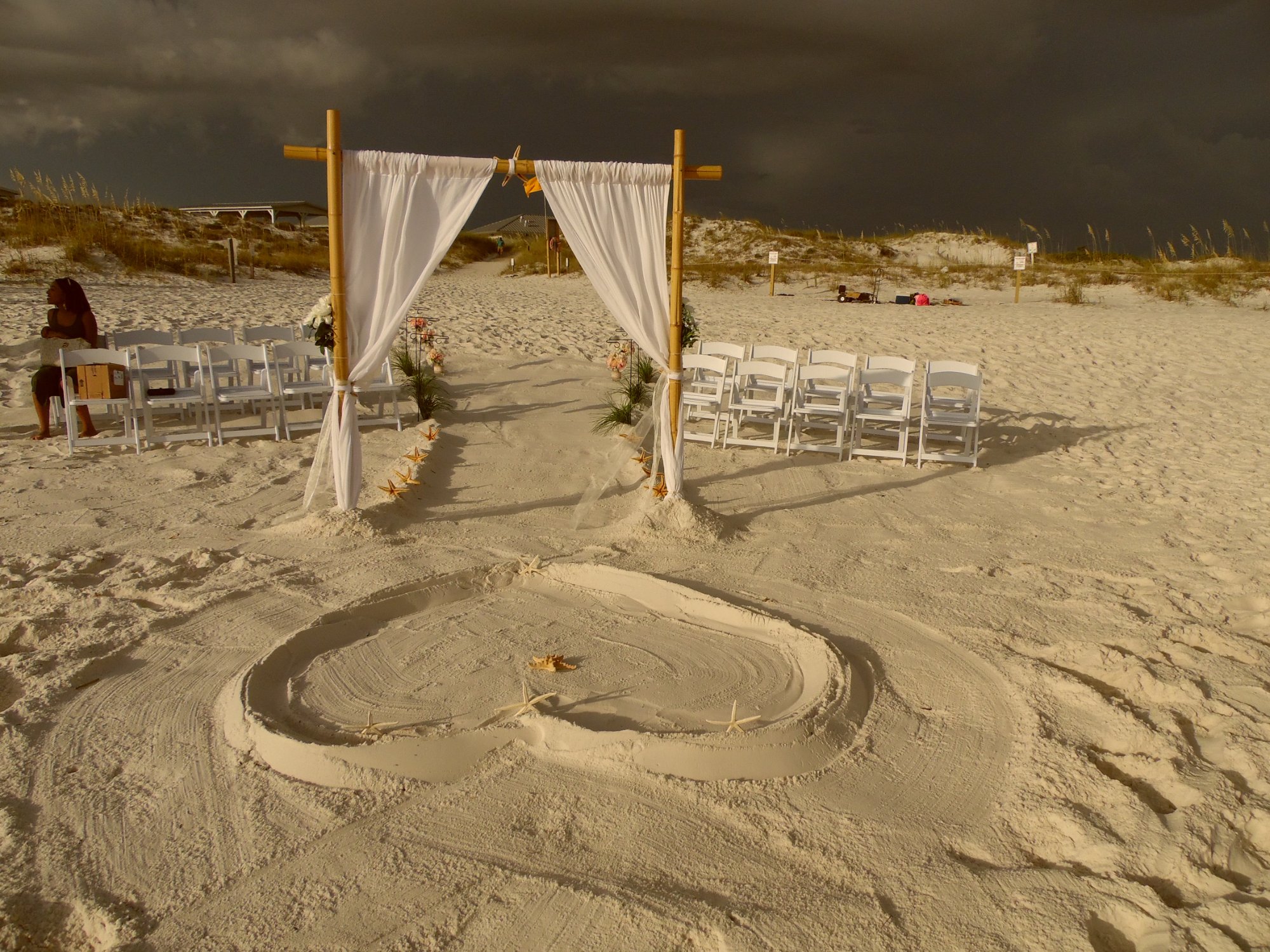 Heart sand art with champagne reception setup