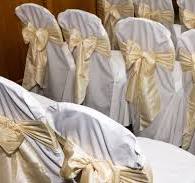 Close-up ivory satin sash bow