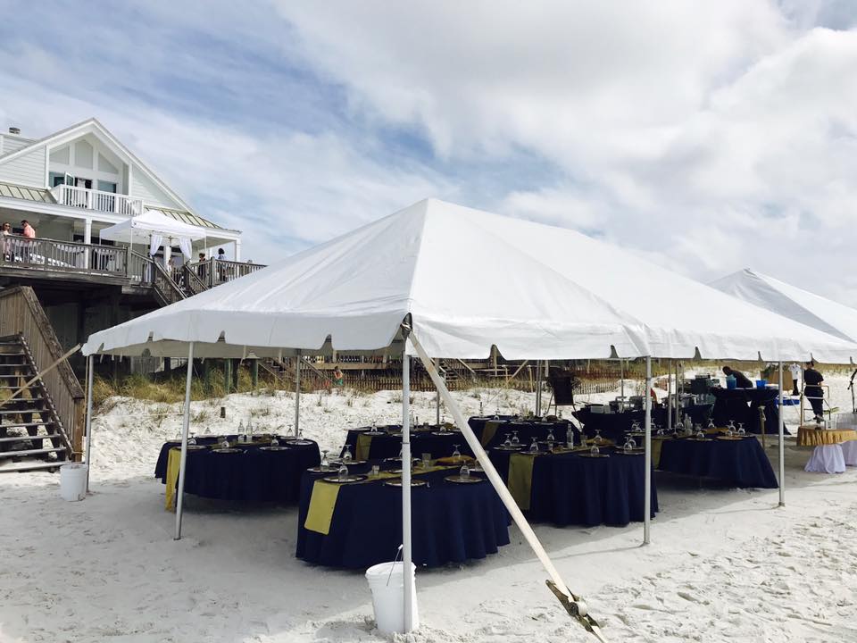 Frame tent with venue house in background