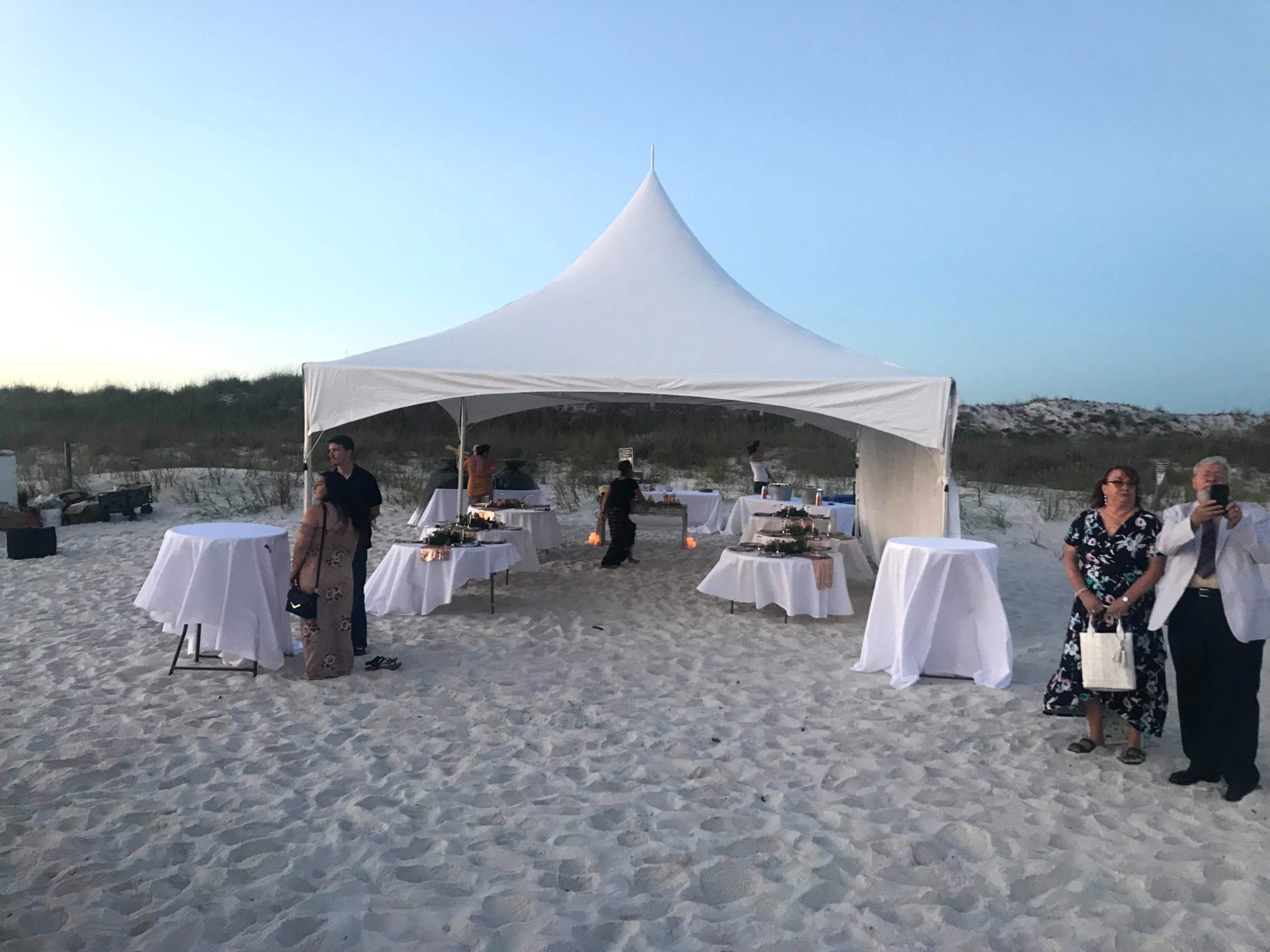 40 Hex tent at dusk coastal event